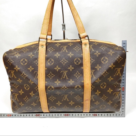 Louis Vuitton Handbags - Louis Vuitton Brown Monogram Duffel Bag